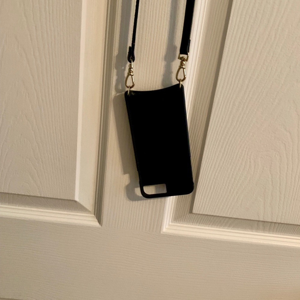 Bandolier phone holder. Fit my iPhone large 6